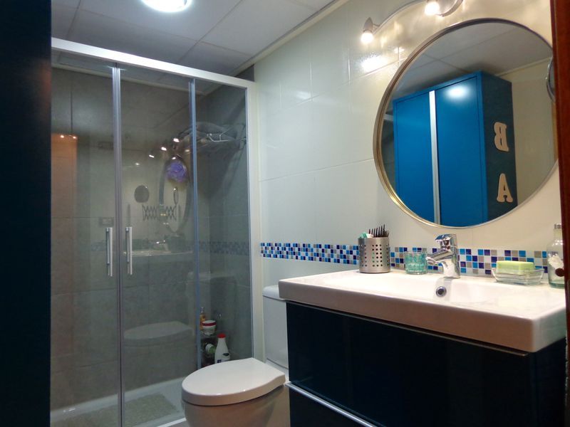 baño-turquesa-lateral