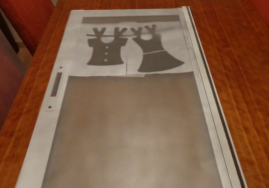 vinilo ventana dibujo bajo cristal